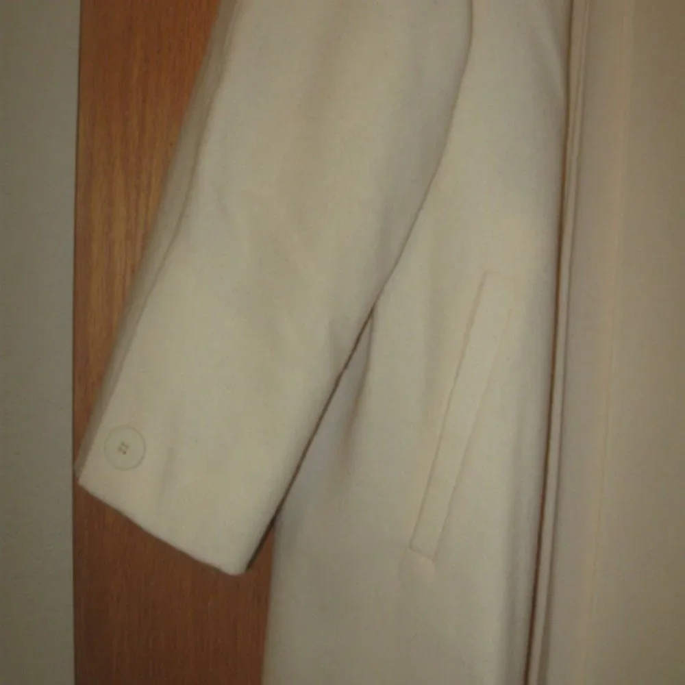 Jonathan Michael Off White Open Pleated Wool Coat